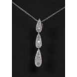 A diamond encrusted triple droplet pendant necklace,