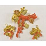 A 19th century coral and yellow metal brooch and earring suite,