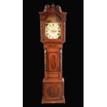 A George/William IV oak and mahogany longcase clock, 36cm arched painted dial,