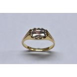 A diamond solitaire ring, rectangular cushion cut diamond, measuring approx 7.5mm x 4.