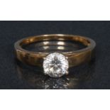 A diamond solitaire ring, round brilliant cut diamond, measuring 6.73mm x 6.72mm x 4.