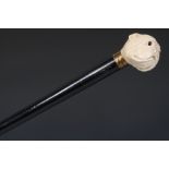 A 19th century gentleman's novelty walking cane, the ivory pommel boldly carved as a bulldog's head,