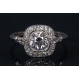 A diamond cluster ring, central cushion cut diamond approx 1.