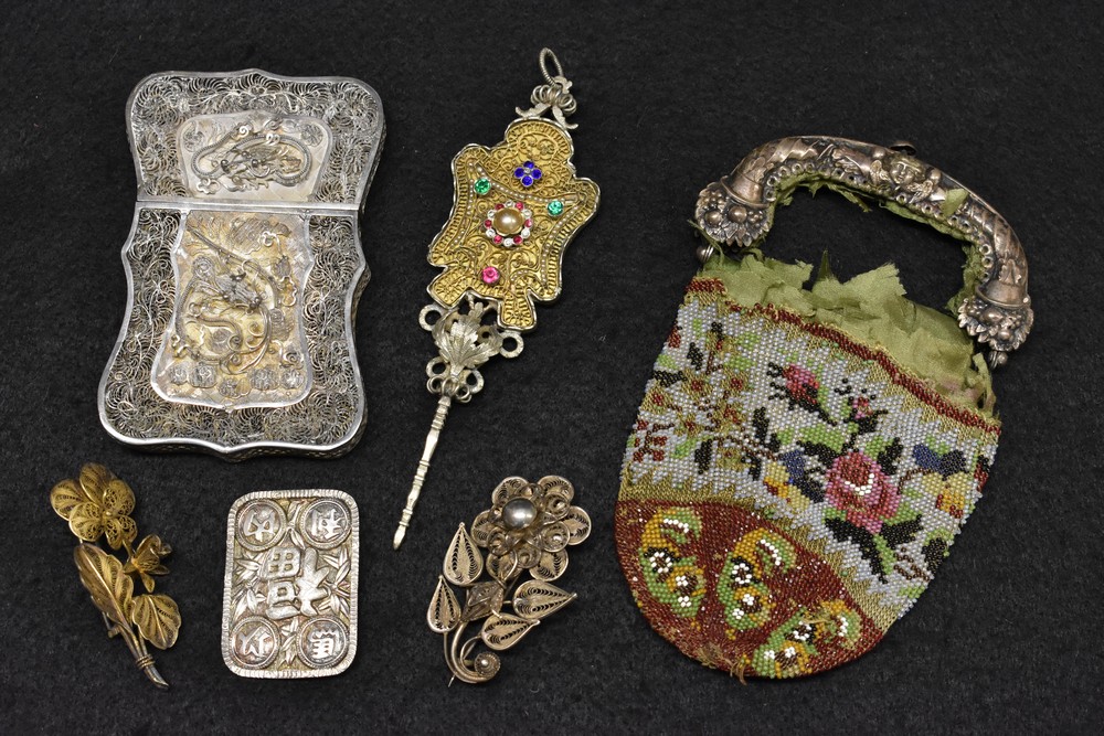 A Chinese silver filigree shaped rectangular visiting card case, Dragon and foliate decoration,