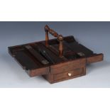 A George IV rosewood rectangular portable scribe's writing box, turned handle, hinged twin-covers,