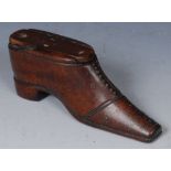 A 19th century mahogany novelty snuff box, as a shoe, decorated with brass pinwork, sliding cover,