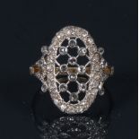 A diamond lattice panel ring, open lattice inset with ten round rose cut diamonds,