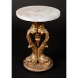 A 19th century giltwood and gesso statuary pedestal, circular marble top above three dolphins,