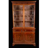 A late Victorian mahogany library bookcase, of George III design,