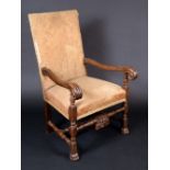 A 17th century style walnut armchair, rectangular back,