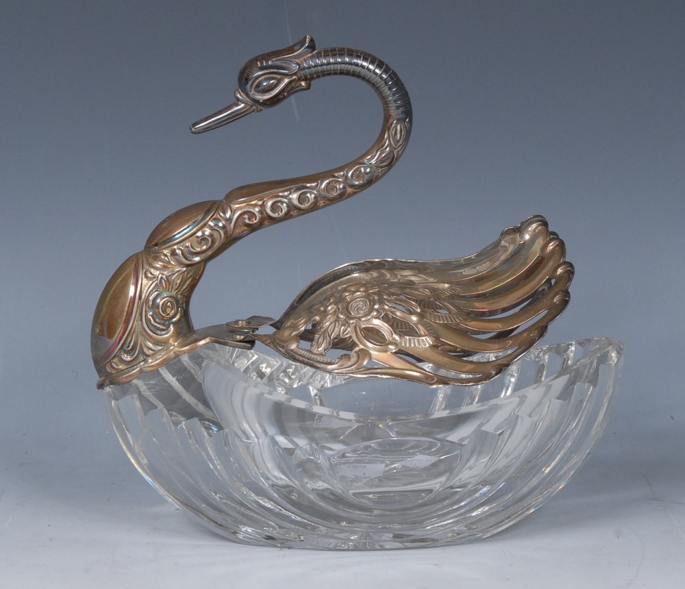 A Continental silver and glass novelty swan spoon warmer,clear glass base,