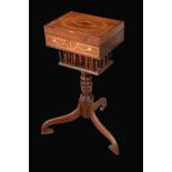 A 19th century Anglo Indian hardwood combination writing and work table, hinged cover,