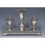 A 19th century Italian silver rectangular inkstand, campana shaped wells,