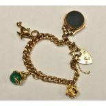 A 9ct rose gold graduated curb link Albert chain bracelet, with heart shaped padlock,