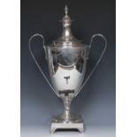 A George III Neo-Classical silver tea urn, lofty cover with vasular finial, bright-cut engraved,