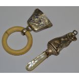 An Edwardian silver rattle, ivory teether, Birmingham 1910; another,