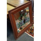 A large decorative mirror, bevelled edge glass,