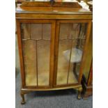 An early 20th Century glazed display cabinet