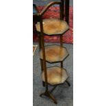 A mahogany three tier octagonal cake stand c 1920