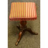 A Victorian mahogany tripod piano stool, c.