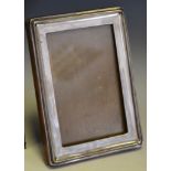 A George V silver easel photograph frame,