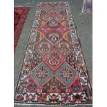 An Antique Persian Balchitiar Runner 303 x 107cm