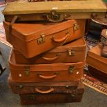 Vintage Luggage/Shooting - a leather and canvas gun case; battered leather suitcases;