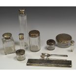 A dressing table set with silver plated lids, silver topped jar,