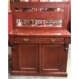 A Victorian mahogany chiffonier, spindled gallery and mirror to top,