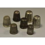 A George V silver thimble, Birmingham 1926; others,