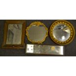 A gilt framed circular convex mirror; an oak framed Art Deco style mirror;