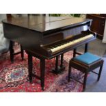 A Waddington baby grand piano with piano stool (2)