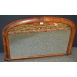 A Victorian walnut oval overmantel c 1870