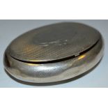 A large 19th century Continental silver oval snuff box, marked 800, c.