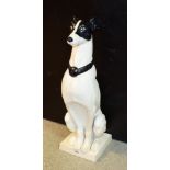 A large cast metal model, greyhound seated,