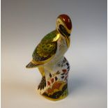 A Royal Crown Derby paperweight, Green Woodpecker, gold stopper, 17.