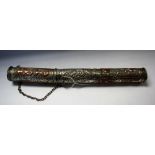 An Indian silver-coloured metal and copper scroll case, chased with script and scrolling foliage,