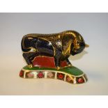 A Royal Crown Derby paperweight, Bull, gold stopper, 14cm high, printed marks,