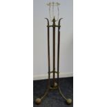 An Arts and Crafts brass lamp stand, telescopic movement,