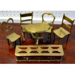 Victorian miniature brass furniture consisting of a tilt top tripod table,
