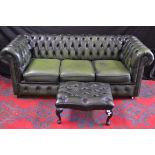 A three seat green Chesterfield sofa and a matching footstool