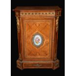 A Louis XVI revival gilt metal and porcelain mounted kingwood and marquetry pier cabinet,