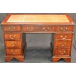 A mahogany twin pedestal desk