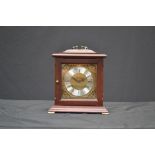 A mahogany cased mantel clock