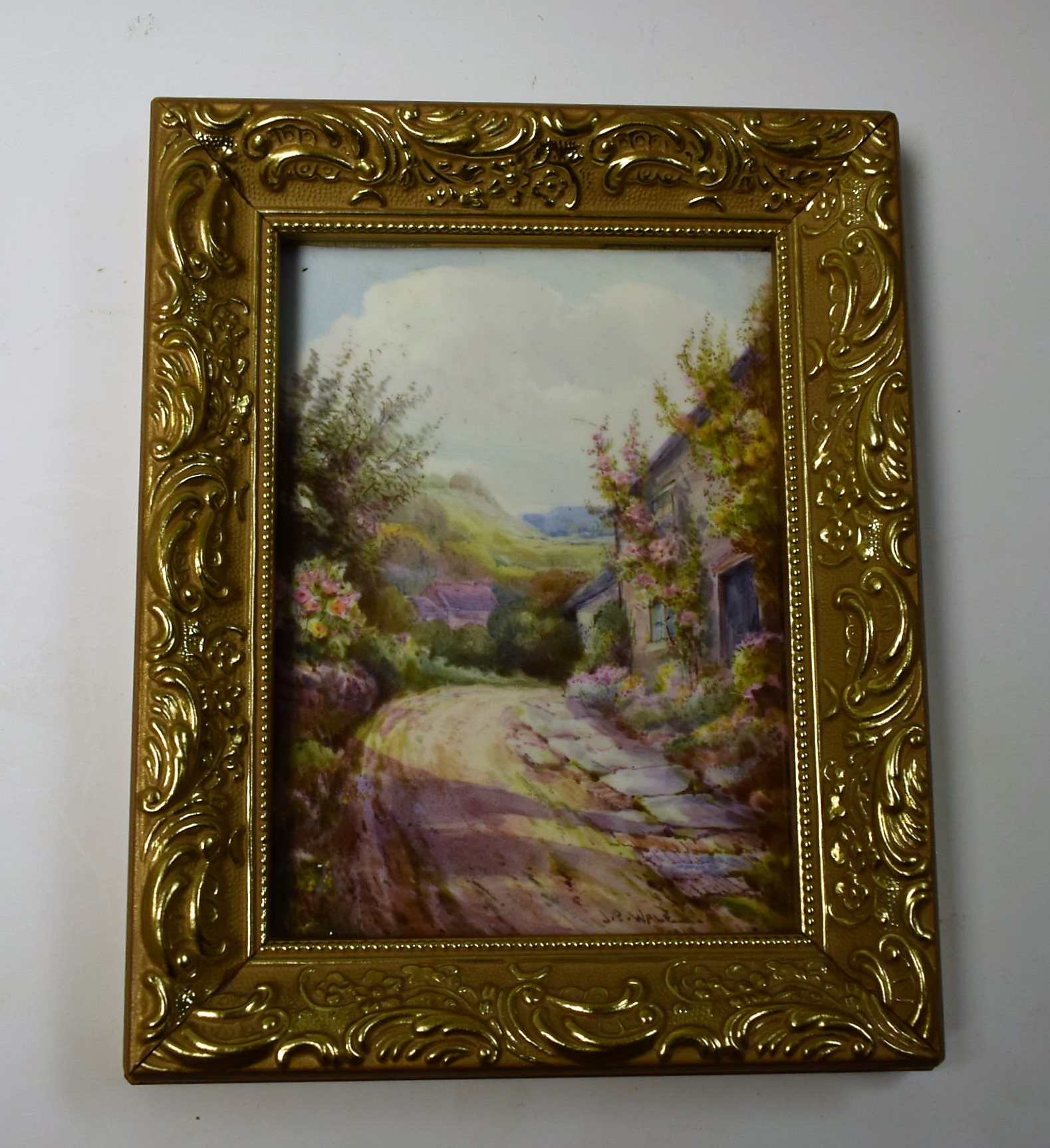 A Derby rectangular plaque, painted by John Porter Wale, signed, with cottage, in summer,