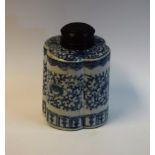 A Chinese quatrefoil shaped blue and white tea caddy, turned treen cover,