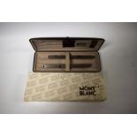 A Mont Blanc Turbo fountain pen and stylus pen, engine turned stainless steel barrels and tops,