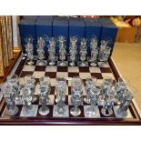 A Lord of The Rings novelty pewter chess set, by Royal Selangor, each piece as a shot glass,