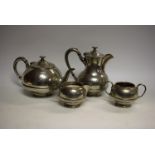 A James Dixon planished pewter tea service, including teapot, hot water jug,