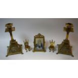 A pair of Victorian brass candlesticks,